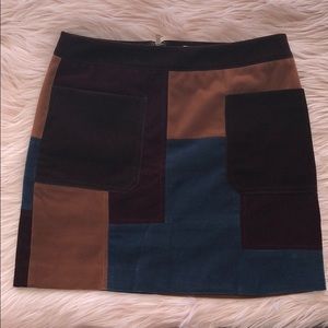 Patchwork velvet/suede feeling material skirt.